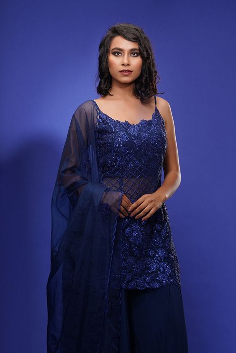 A model showcasing Navy Blue Cocktail Sharara by Shruti S Label from Shruti S Label's collection
