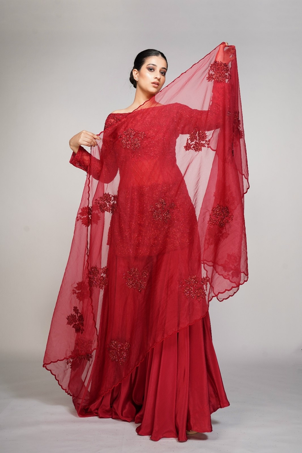 A model showcasing Red Cocktail Sharara Feature image by Shruti S Label from Shruti S Label's collection