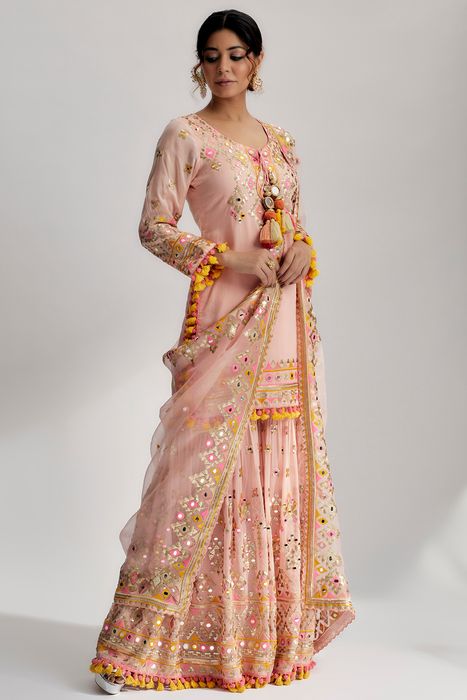 A model showcasing Pink Friya Short Kurta Sharara Set by Gopi Vaid from Gopi Vaid's collection