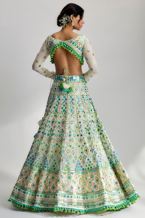A model showcasing Ivory Alani Lehenga Set by Gopi Vaid from Gopi Vaid's collection