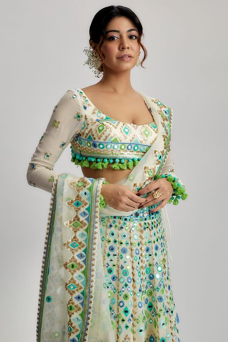 A model showcasing Ivory Alani Lehenga Set by Gopi Vaid from Gopi Vaid's collection