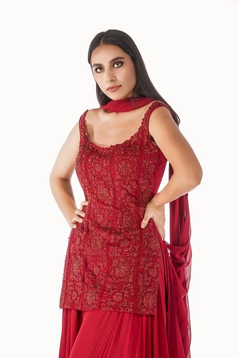 A model showcasing Lal Gharara by Shruti S Label from Shruti S Label's collection A model showcasing Lal Gharara by Shruti S Label from Shruti S Label's collection