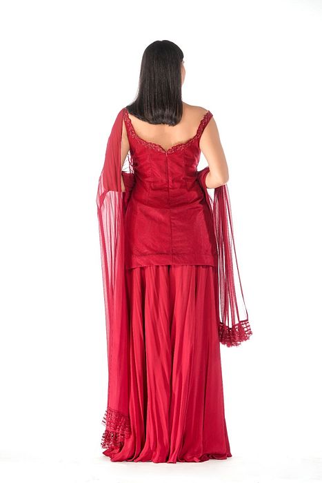 A model showcasing Lal Gharara by Shruti S Label from Shruti S Label's collection A model showcasing Lal Gharara by Shruti S Label from Shruti S Label's collection