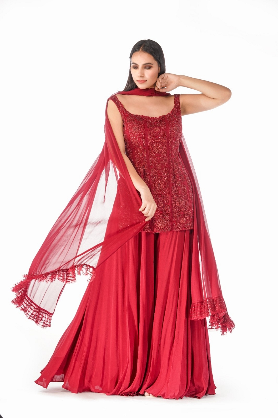 A model showcasing Lal Gharara Feature image by Shruti S Label from Shruti S Label's collection
