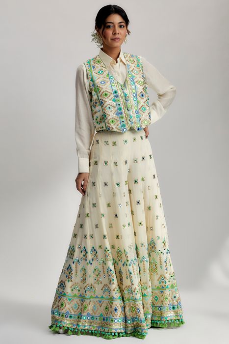A model showcasing Amara Jacket Set With Flared Pants In Ivory by Gopi Vaid from Gopi Vaid's collection