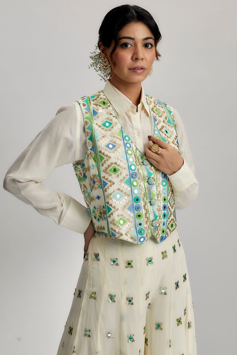 A model showcasing Amara Jacket Set With Flared Pants In Ivory by Gopi Vaid from Gopi Vaid's collection