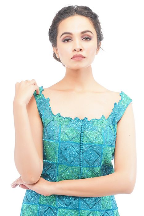 A model showcasing Turquoise Dual Tone Sharara Set by Shruti S Label from Shruti S Label's collection