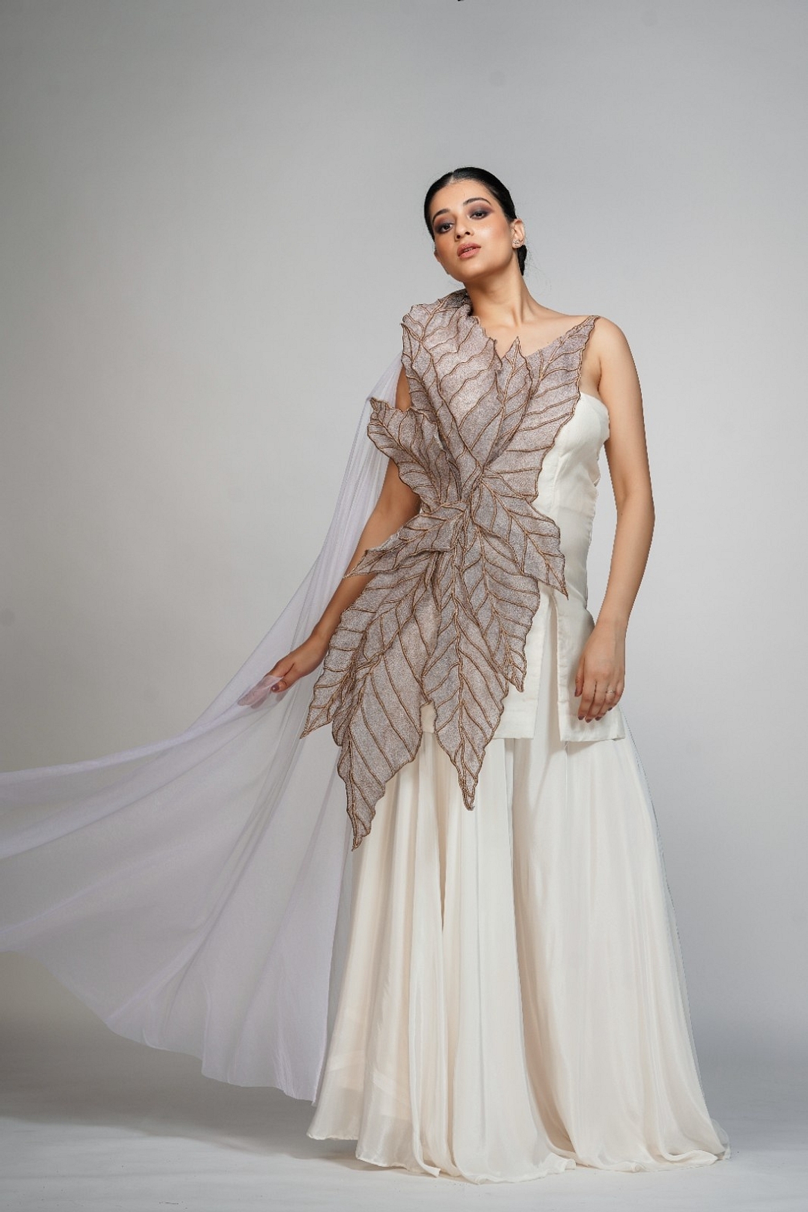 A model showcasing Off White Leaf Sharara Suit Feature image by Shruti S Label from Shruti S Label's collection