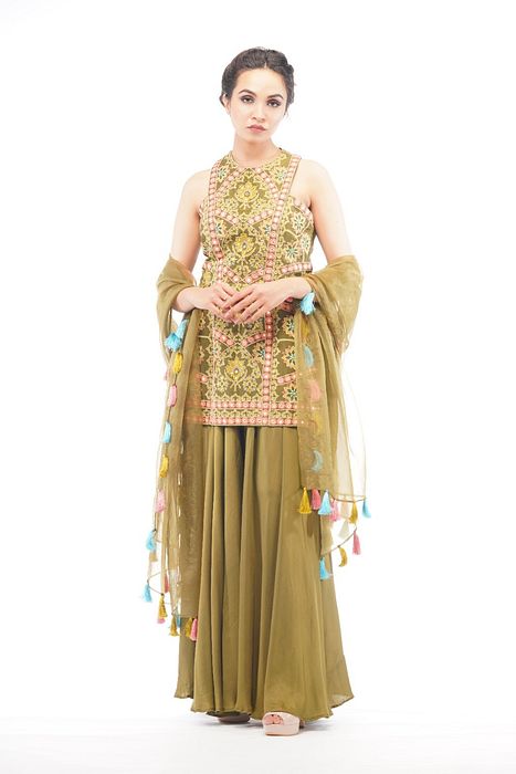 A model showcasing Boho Thread Work Racer Cut Sharara Set by Shruti S Label from Shruti S Label's collection