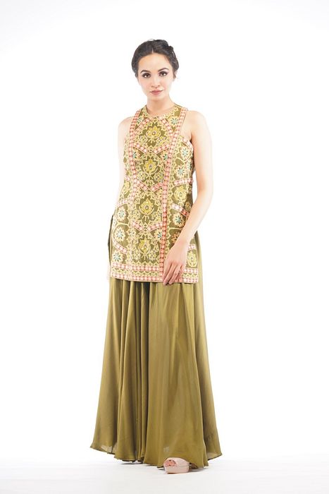 A model showcasing Boho Thread Work Racer Cut Sharara Set by Shruti S Label from Shruti S Label's collection