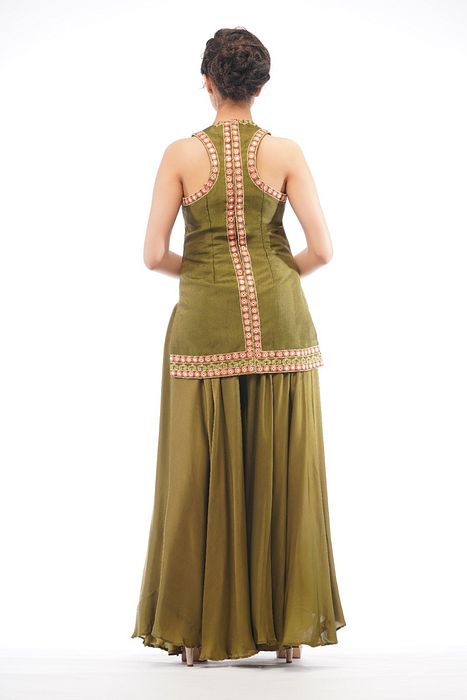 A model showcasing Boho Thread Work Racer Cut Sharara Set by Shruti S Label from Shruti S Label's collection