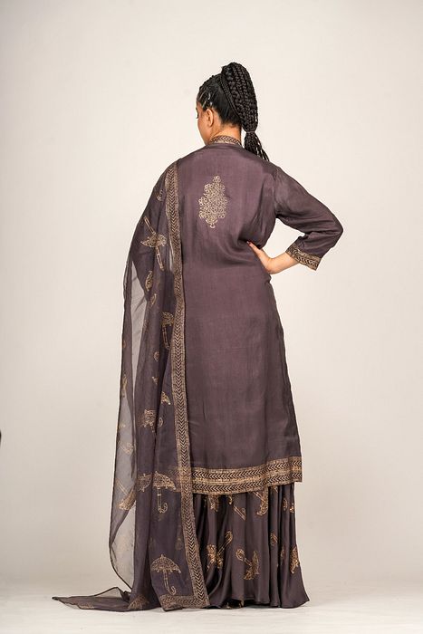 A model showcasing Metallic Print Sharara With Long Shirt by Shruti S Label from Shruti S Label's collection