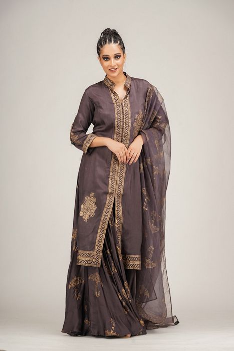 A model showcasing Metallic Print Sharara With Long Shirt by Shruti S Label from Shruti S Label's collection