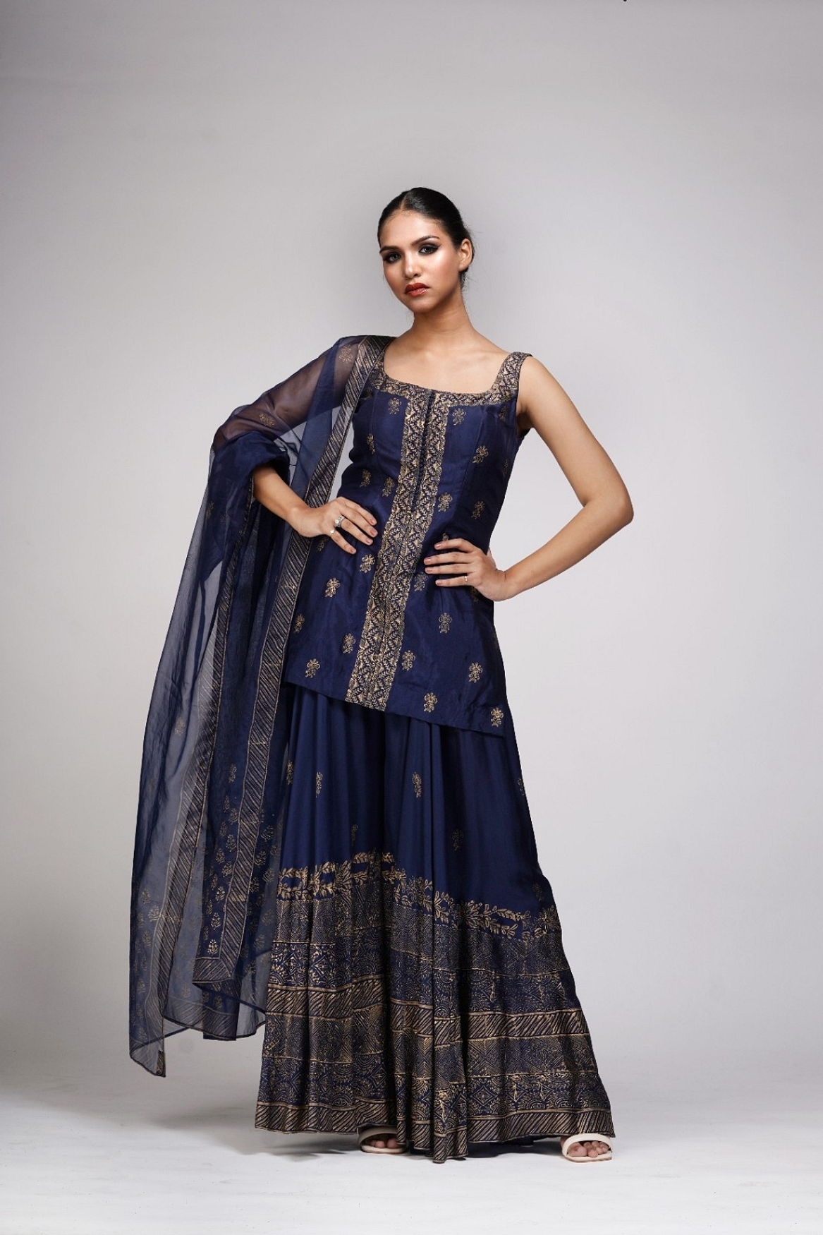 A model showcasing Metallic Print Navy Blue Sharara Suit Feature image by Shruti S Label from Shruti S Label's collection