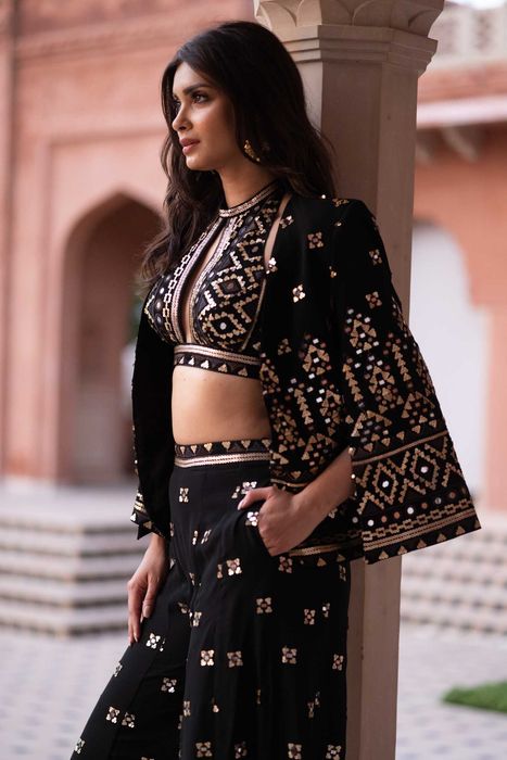 A model showcasing Diana Penty In Jiya Coord Set With Blazer In Black by Gopi Vaid from Gopi Vaid's collection