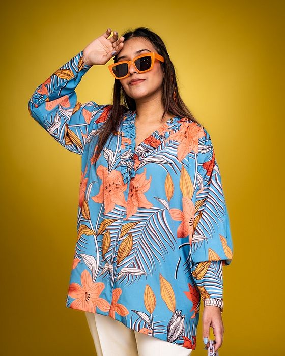 A model showcasing Daylily Blue Oversized Shirt by Fuga Clothing from Fuga Clothing's collection