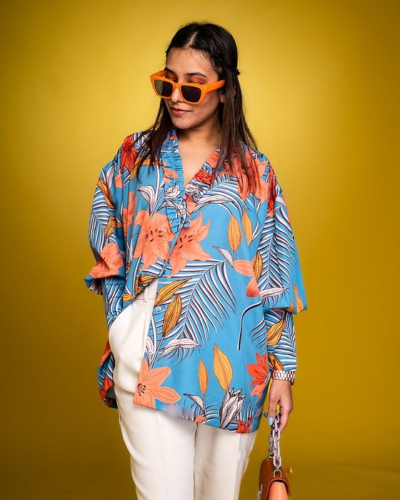 A model showcasing Daylily Blue Oversized Shirt Feature image by Fuga Clothing from Fuga Clothing's collection