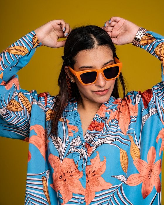 A model showcasing Daylily Blue Oversized Shirt by Fuga Clothing from Fuga Clothing's collection