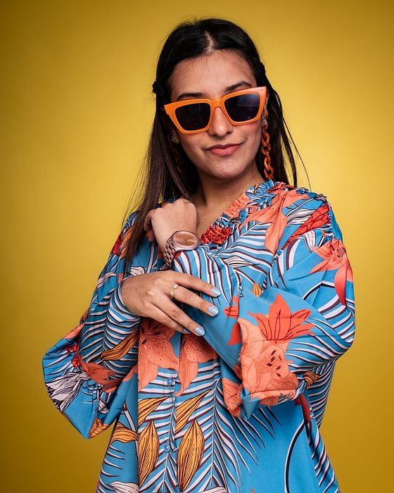 A model showcasing Daylily Blue Oversized Shirt by Fuga Clothing from Fuga Clothing's collection