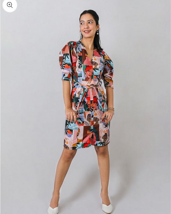 A model showcasing Fuga Pop Sheath Dress by Fuga Clothing from Fuga Clothing's collection A model showcasing Fuga Pop Sheath Dress by Fuga Clothing from Fuga Clothing's collection