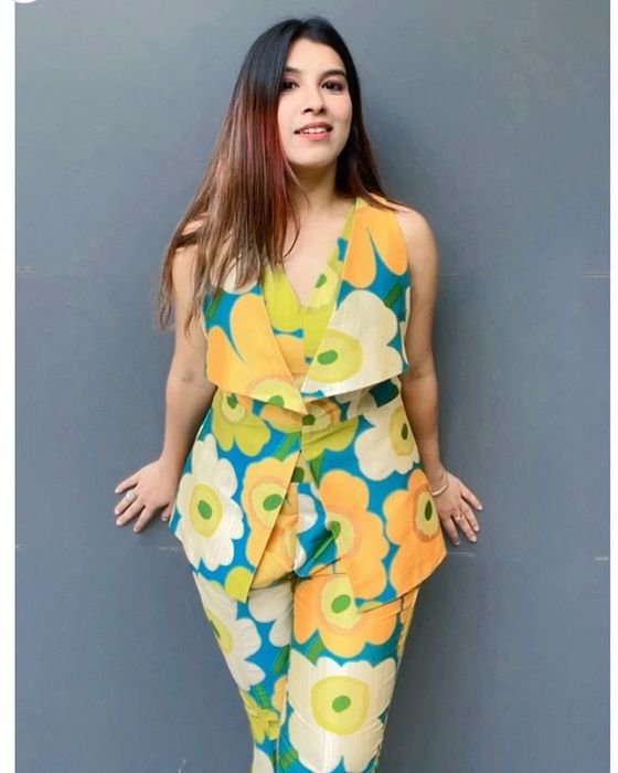 A model showcasing Green Flora Silk Set by Fuga Clothing from Fuga Clothing's collection A model showcasing Green Flora Silk Set by Fuga Clothing from Fuga Clothing's collection