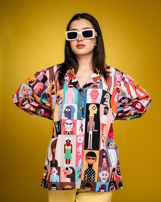 A model showcasing Play All Day Oversized Shirt by Fuga Clothing from Fuga Clothing's collection A model showcasing Play All Day Oversized Shirt by Fuga Clothing from Fuga Clothing's collection
