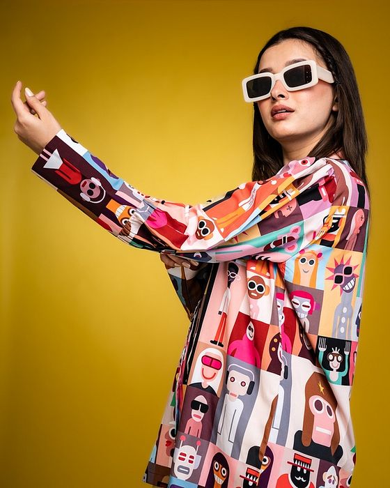 A model showcasing Play All Day Oversized Shirt by Fuga Clothing from Fuga Clothing's collection A model showcasing Play All Day Oversized Shirt by Fuga Clothing from Fuga Clothing's collection