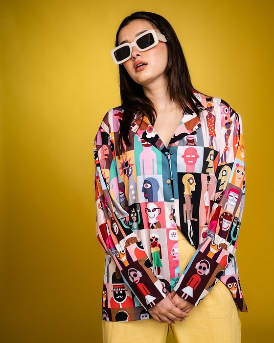 A model showcasing Play All Day Oversized Shirt by Fuga Clothing from Fuga Clothing's collection A model showcasing Play All Day Oversized Shirt by Fuga Clothing from Fuga Clothing's collection