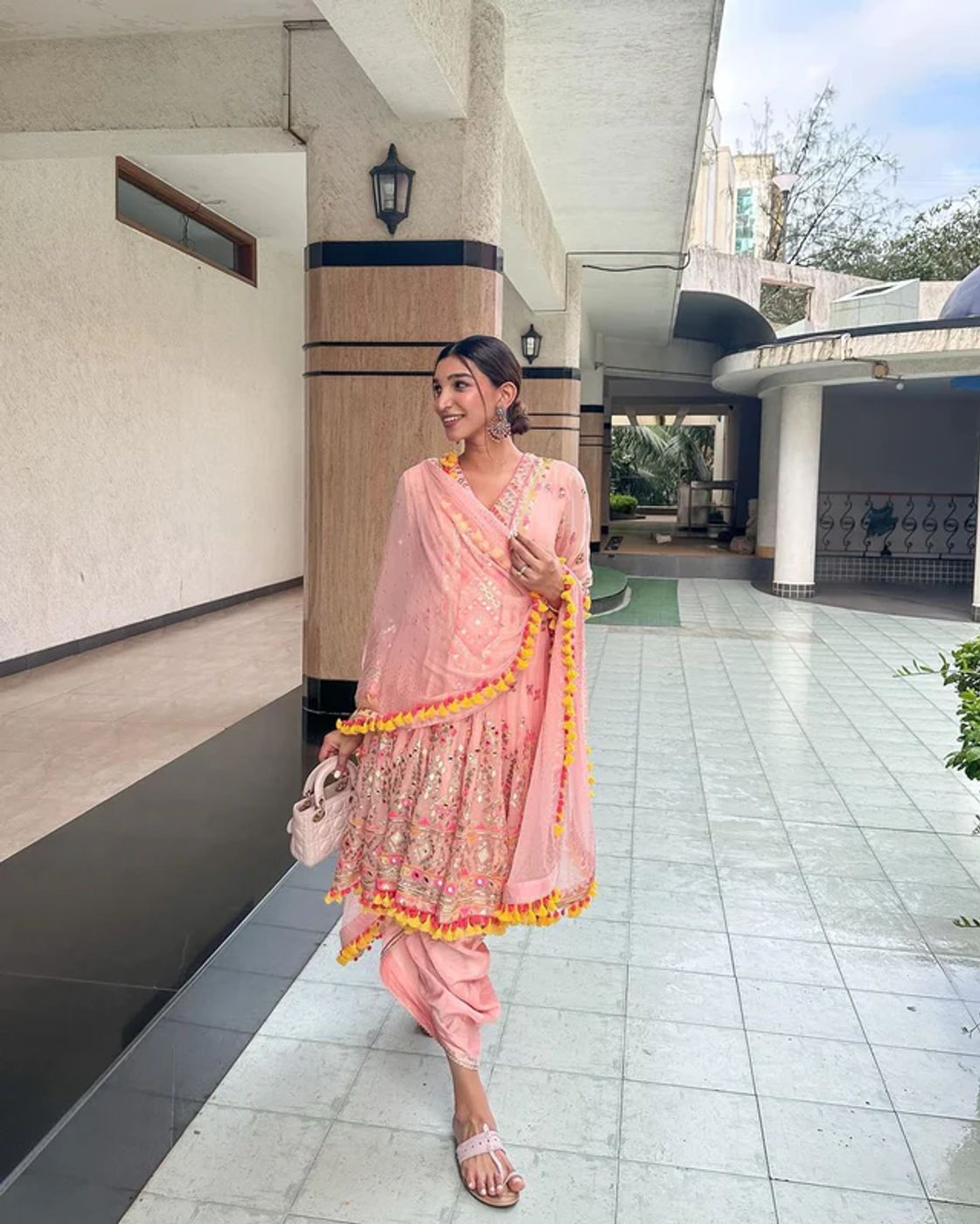 A model showcasing Juhi Godambe In Pink Priyal Dhoti Set Feature image by Gopi Vaid from Gopi Vaid's collection