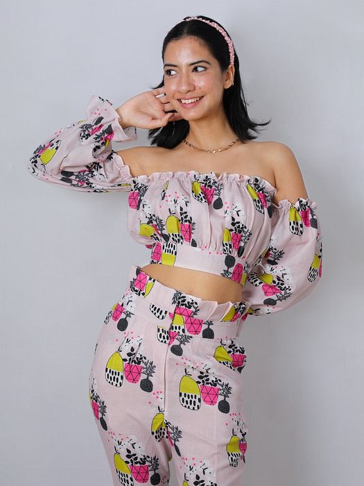 A model showcasing Tropical Flounce Set by Fuga Clothing from Fuga Clothing's collection A model showcasing Tropical Flounce Set by Fuga Clothing from Fuga Clothing's collection