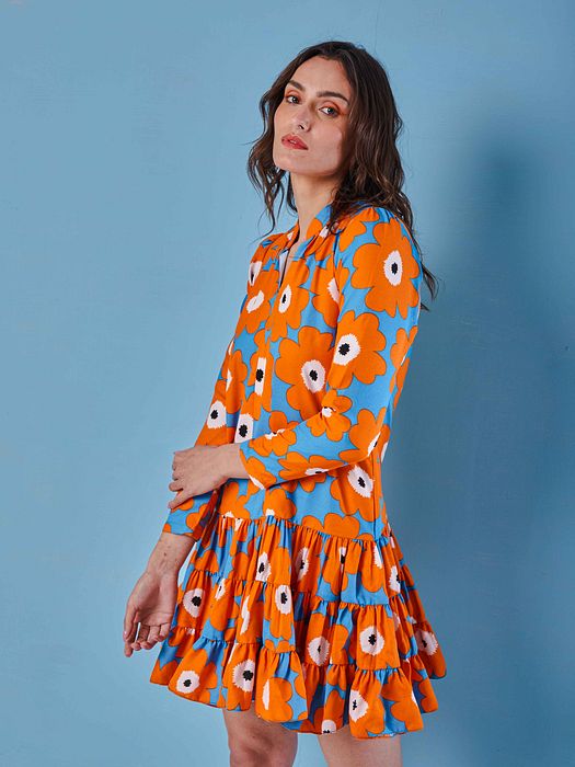A model showcasing Joyful Dress by Fuga Clothing from Fuga Clothing's collection A model showcasing Joyful Dress by Fuga Clothing from Fuga Clothing's collection
