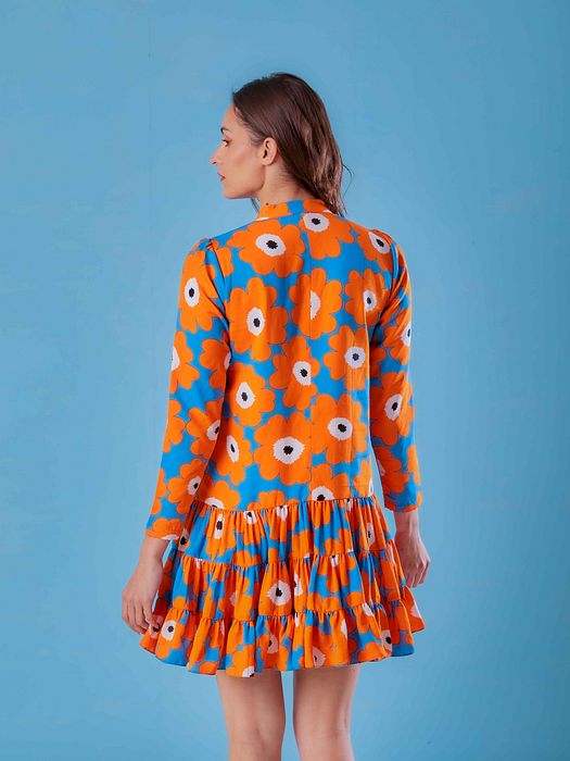 A model showcasing Joyful Dress by Fuga Clothing from Fuga Clothing's collection A model showcasing Joyful Dress by Fuga Clothing from Fuga Clothing's collection