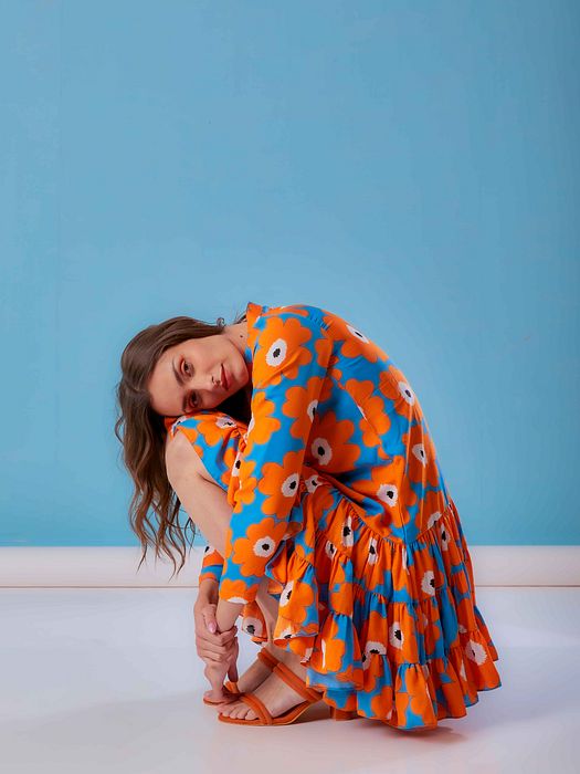 A model showcasing Joyful Dress by Fuga Clothing from Fuga Clothing's collection A model showcasing Joyful Dress by Fuga Clothing from Fuga Clothing's collection