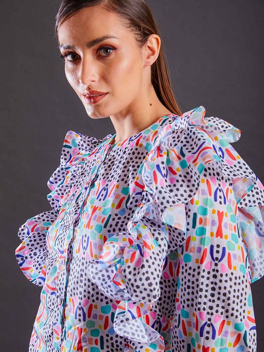 A model showcasing Dot And Curve Dress by Fuga Clothing from Fuga Clothing's collection A model showcasing Dot And Curve Dress by Fuga Clothing from Fuga Clothing's collection