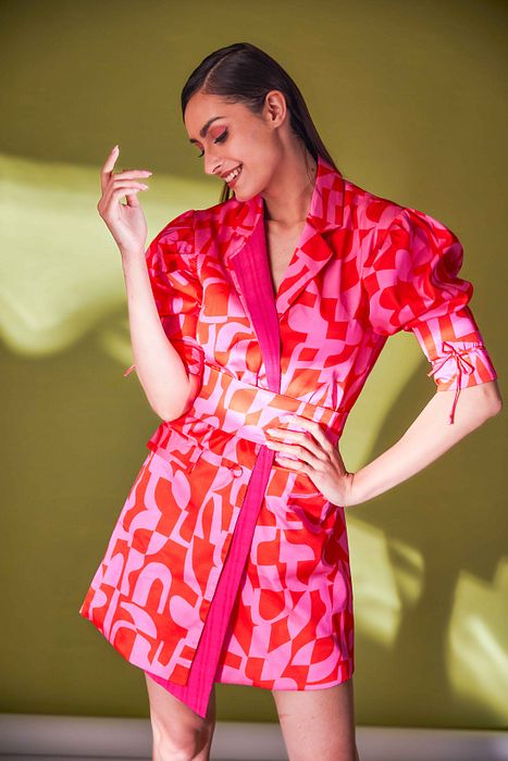 A model showcasing Bonjour Paree Dress by Fuga Clothing from Fuga Clothing's collection A model showcasing Bonjour Paree Dress by Fuga Clothing from Fuga Clothing's collection