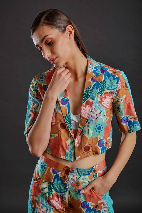 A model showcasing Coral Reef Coord Set by Fuga Clothing from Fuga Clothing's collection A model showcasing Coral Reef Coord Set by Fuga Clothing from Fuga Clothing's collection