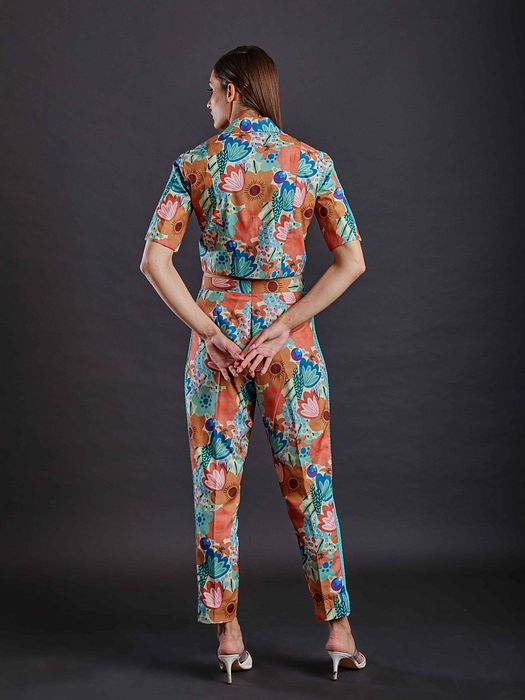 A model showcasing Coral Reef Coord Set by Fuga Clothing from Fuga Clothing's collection A model showcasing Coral Reef Coord Set by Fuga Clothing from Fuga Clothing's collection