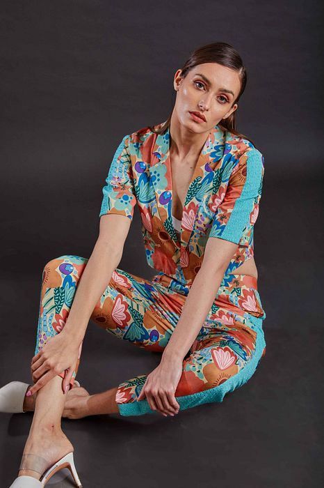 A model showcasing Coral Reef Coord Set by Fuga Clothing from Fuga Clothing's collection A model showcasing Coral Reef Coord Set by Fuga Clothing from Fuga Clothing's collection