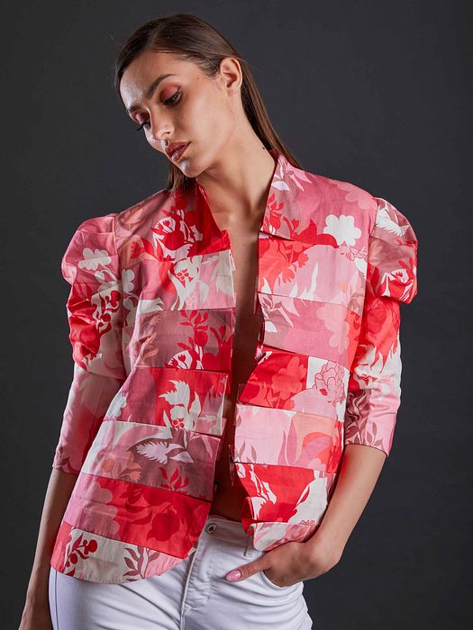 A model showcasing Blush And Rose Blazer by Fuga Clothing from Fuga Clothing's collection A model showcasing Blush And Rose Blazer by Fuga Clothing from Fuga Clothing's collection