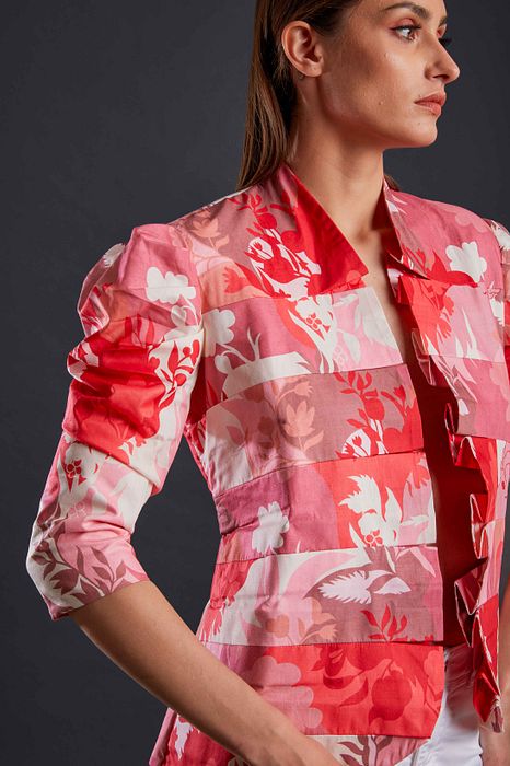 A model showcasing Blush And Rose Blazer by Fuga Clothing from Fuga Clothing's collection A model showcasing Blush And Rose Blazer by Fuga Clothing from Fuga Clothing's collection