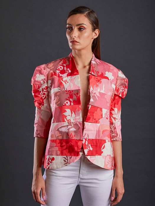 A model showcasing Blush And Rose Blazer by Fuga Clothing from Fuga Clothing's collection