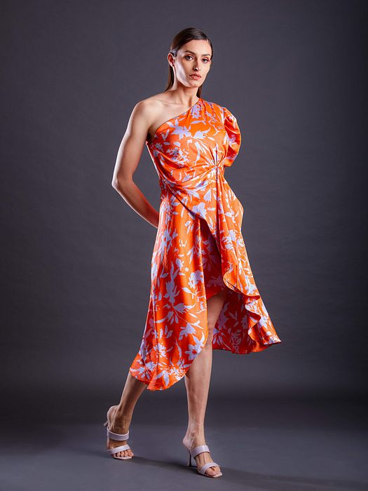A model showcasing Tangerine Dress by Fuga Clothing from Fuga Clothing's collection A model showcasing Tangerine Dress by Fuga Clothing from Fuga Clothing's collection