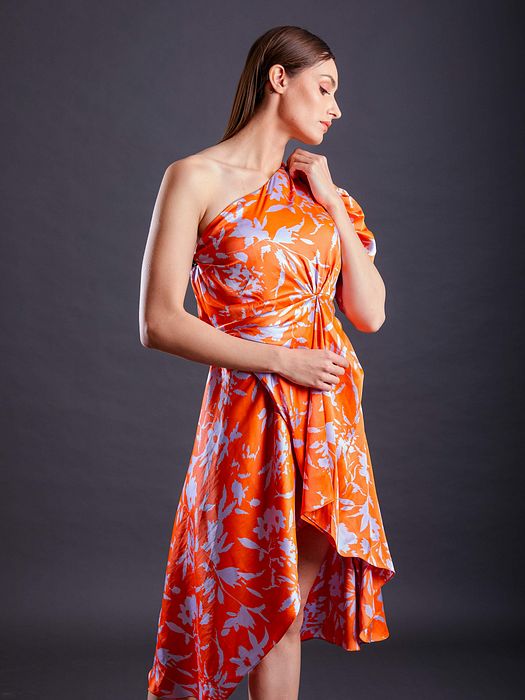 A model showcasing Tangerine Dress by Fuga Clothing from Fuga Clothing's collection A model showcasing Tangerine Dress by Fuga Clothing from Fuga Clothing's collection