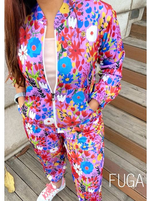 A model showcasing Vibrant Summer Jogger Set by Fuga Clothing from Fuga Clothing's collection A model showcasing Vibrant Summer Jogger Set by Fuga Clothing from Fuga Clothing's collection