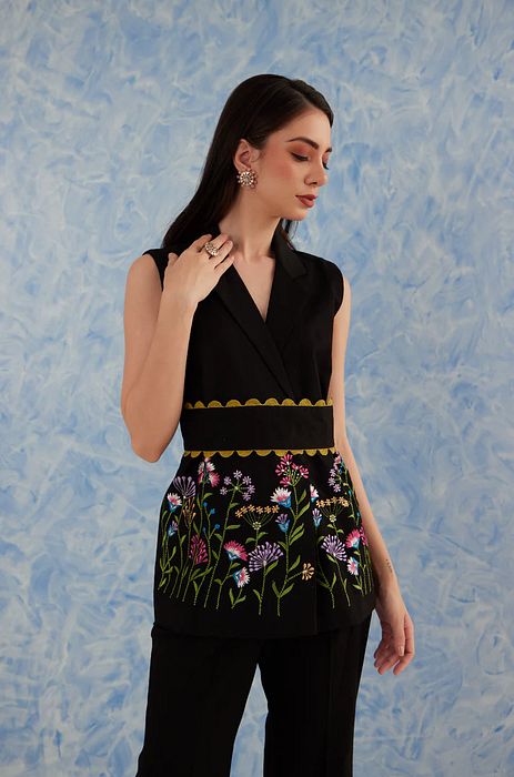 A model showcasing Botanical Black Set by Fuga Clothing from Fuga Clothing's collection A model showcasing Botanical Black Set by Fuga Clothing from Fuga Clothing's collection