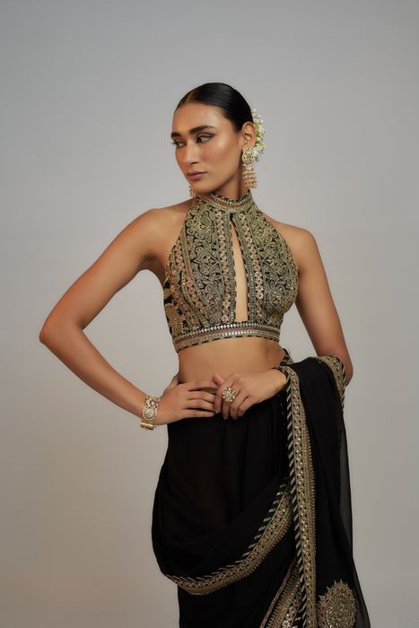 A model showcasing Kubbra Sait And Akanksha Malhotra In Black Golconda Anupa Saree Set by Gopi Vaid from Gopi Vaid's collection