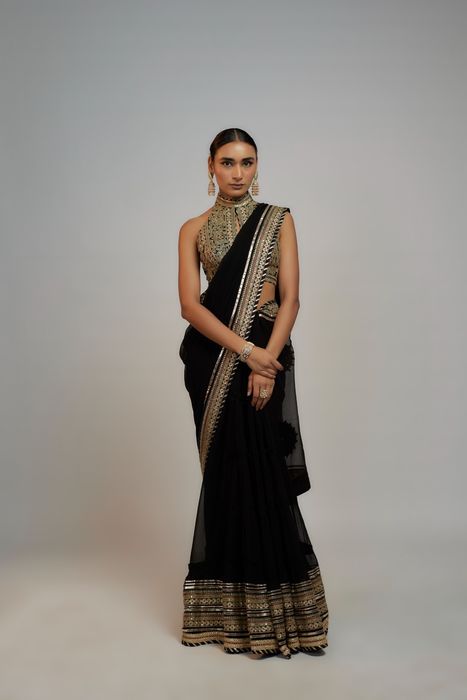 A model showcasing Kubbra Sait And Akanksha Malhotra In Black Golconda Anupa Saree Set by Gopi Vaid from Gopi Vaid's collection