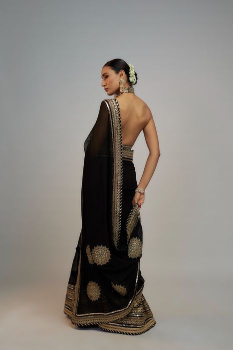 A model showcasing Kubbra Sait And Akanksha Malhotra In Black Golconda Anupa Saree Set by Gopi Vaid from Gopi Vaid's collection