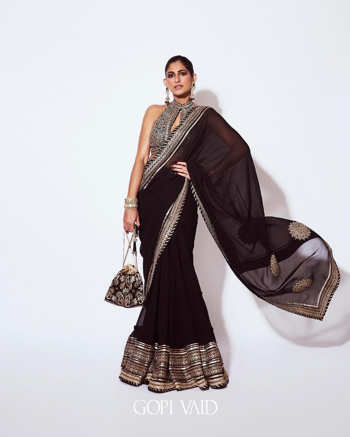 A model showcasing Kubbra Sait And Akanksha Malhotra In Black Golconda Anupa Saree Set Feature image by Gopi Vaid from Gopi Vaid's collection