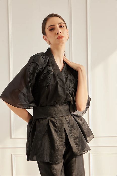 A model showcasing Black Sheer Set by Fuga Clothing from Fuga Clothing's collection A model showcasing Black Sheer Set by Fuga Clothing from Fuga Clothing's collection